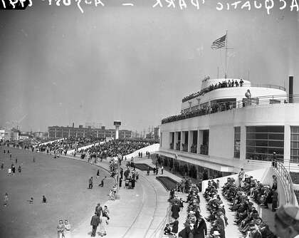 The benches are packed at Aquatic Park building exterior August, 1941