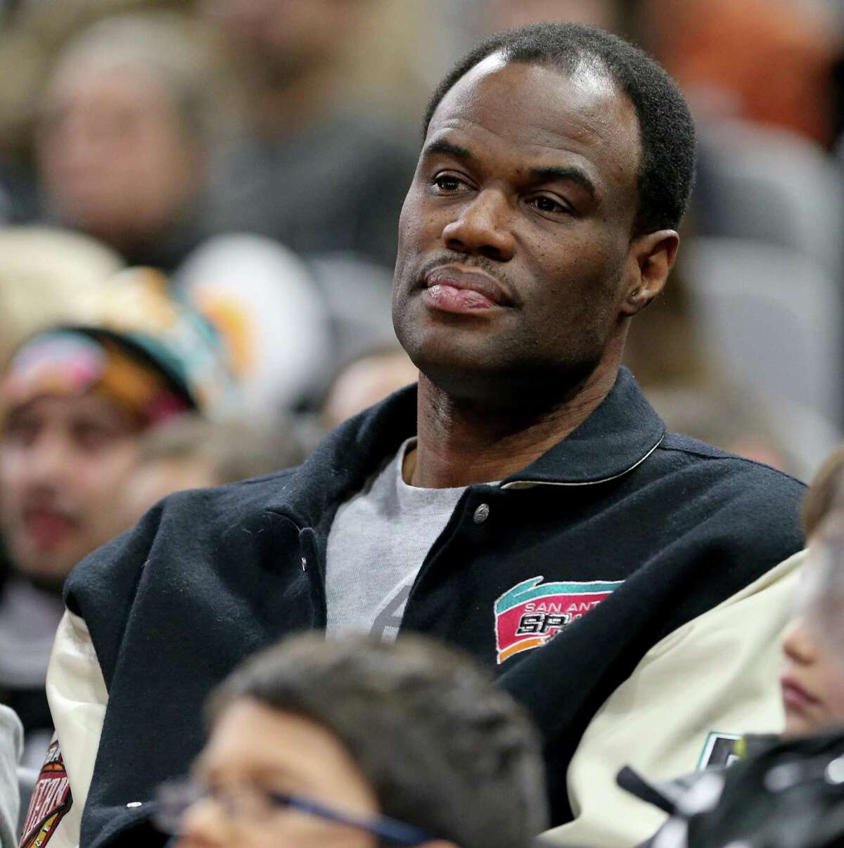 Former San Antonio Spurs player David Robinson watches action against the Charlotte Hornets Saturday Jan. 7, 2017 at the AT&T Center.