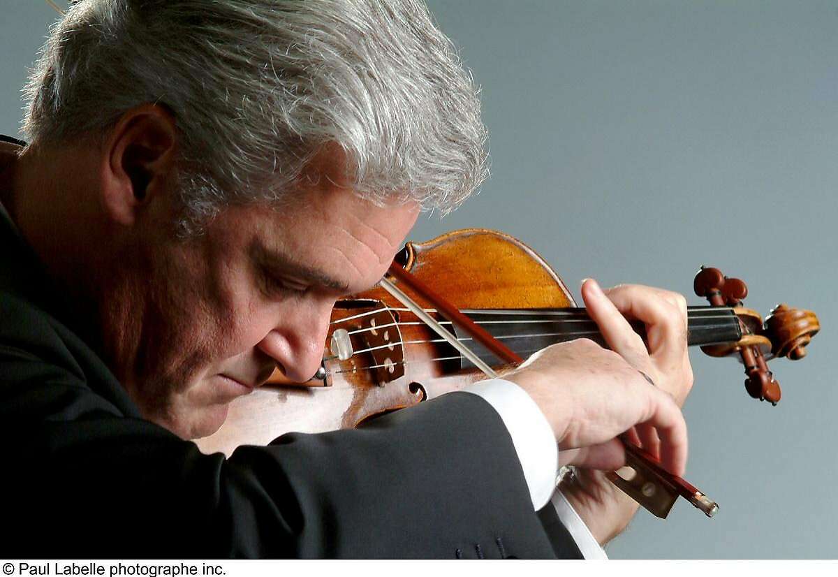 Violinist and conductor Pinchas Zukerman appears with the Royal Philharmonic Orchestra Sunday and Monday