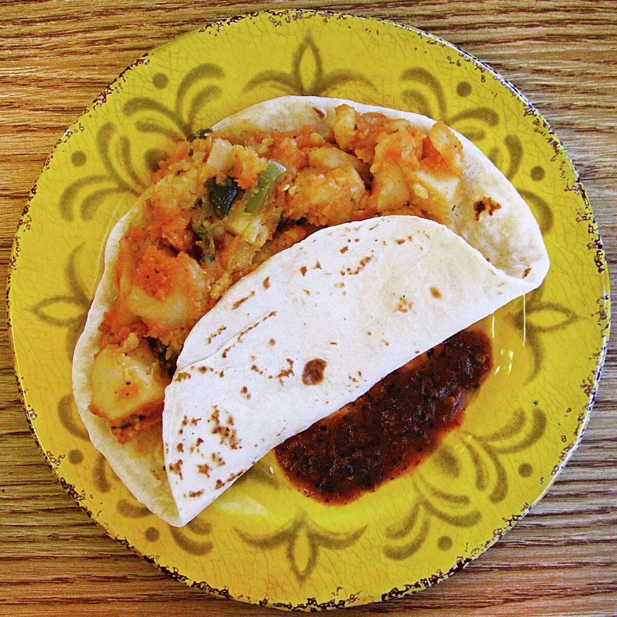 Papas rancheras taco on a handmade flour tortilla from Mi Celayence Mexican Restaurant.