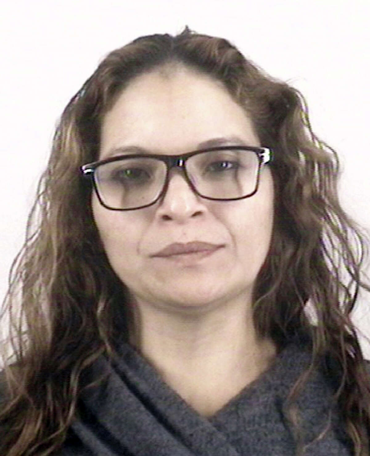 This photo provided by Tarrant County, Texas office shows Rosa Maria Ortega. Ortega, 37, was convicted in Fort Worth this week on two felony counts of illegal voting over allegations that she improperly cast a ballot five times between 2005 and 2014. Her attorney, Clark Birdsall, said Friday, Feb. 10, 2017, that Ortega was a U.S. permanent resident who mistakenly thought she was eligible to vote. He said she voted Republican, including for Texas Attorney General Ken Paxton, whose office helped prosecute her. (Tarrant County, Texas via AP)