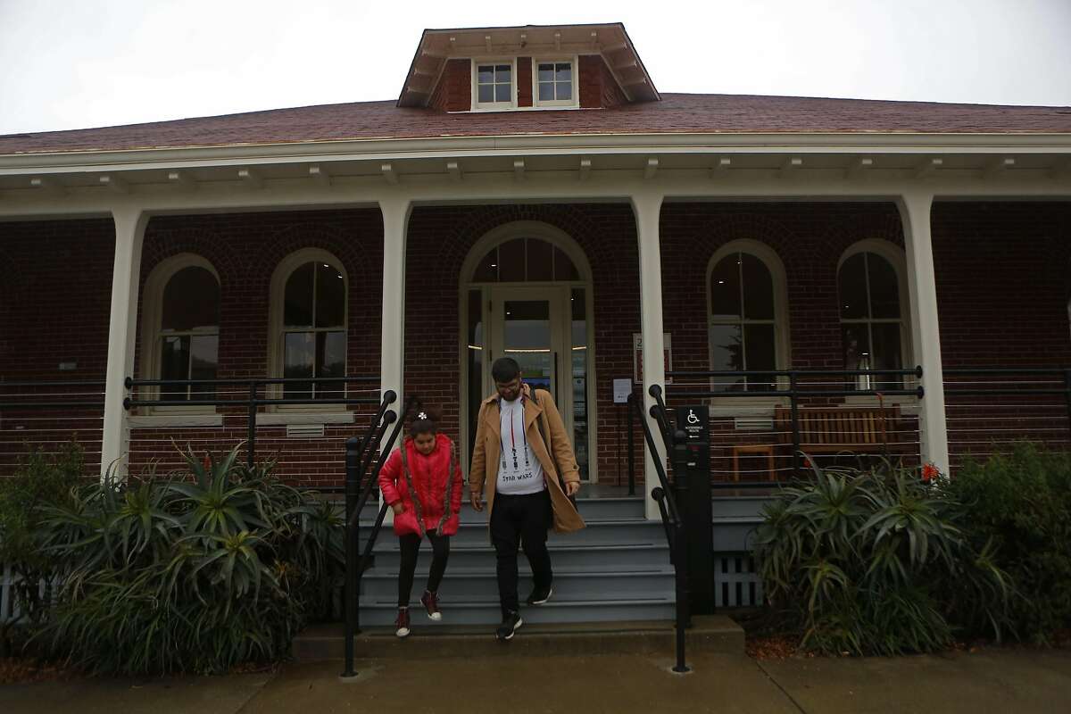 Mikayil Tokdemir leaves the Presidio Visitors Center after his first visit with his daughter, Aleyna, inside the Presidio Visitors Center on Friday, Feb. 17, 2017, in San Francisco, Calif.
