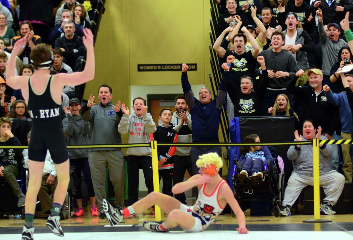 The crowd reacts to Trumbull's Matthew Ryan defeating Danbury's Ben LeBlanc during Class LL Boys Championship Wrestling Tournament action in Trumbull, Conn. on Saturday Feb. 18, 2017.