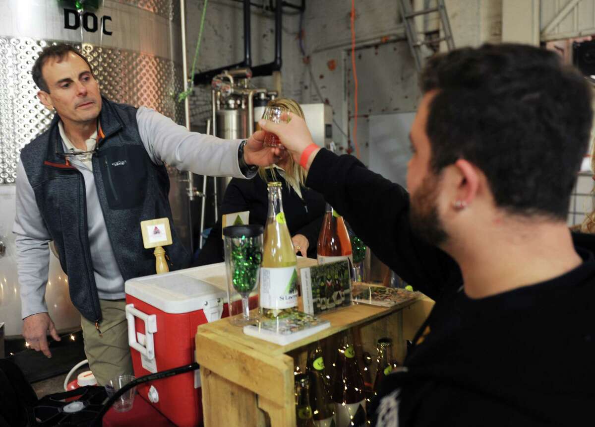 Roughly 800 people were in Albany, N.Y. Feb. 18, 2017 for an event at Nine Pine Cider that brought together 15 different cider producers. The even followed years of growth of the cider market in New York, which because of its location and variety of apples is one of the best states in the nation for the product. (Robert Downen / Times Union)