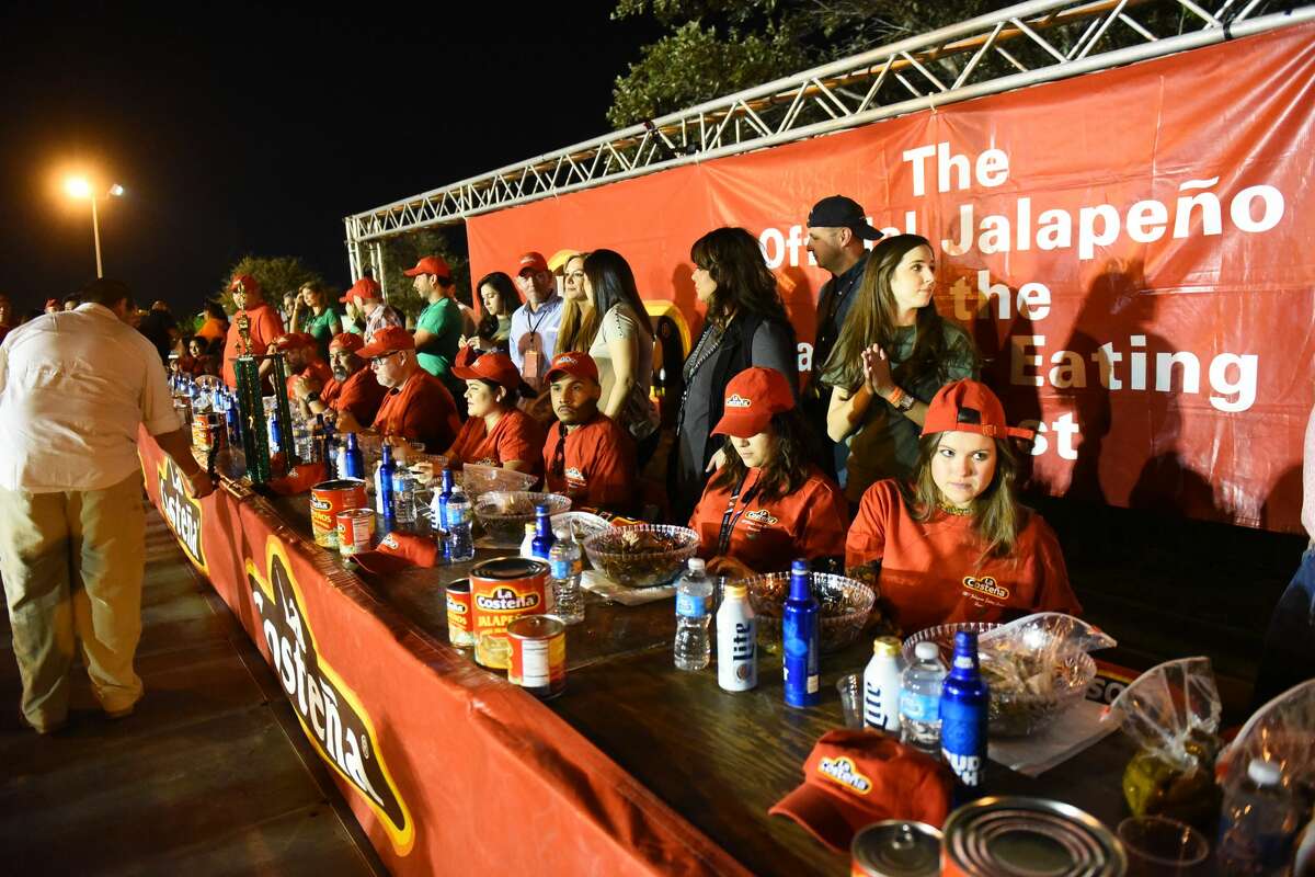 21 contestants endure the La Costena Jalapeno Eating Contest on Saturday, February 18, 2017 at El Metro Park and Ride during the La Costena Jalapeno Festival.