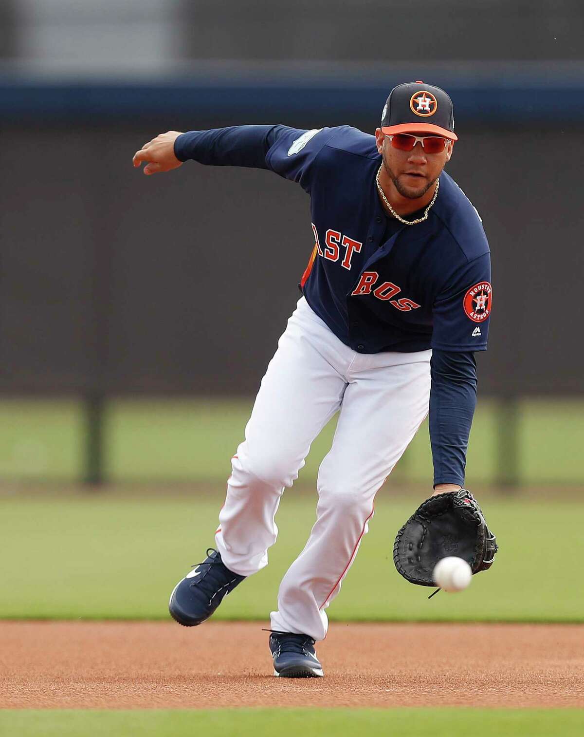 Houston Astros Yulieski Gurriel (10) catches a ground ball at first base during spring training at The Ballpark of the Palm Beaches, in West Palm Beach, Florida, Saturday, February 18, 2017. ( Karen Warren / Houston Chronicle )