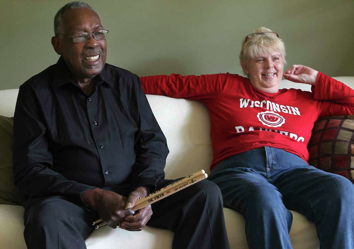 In this Oct. 23, 2013 photo, legendary drummer Clyde Stubblefield, is pictured with his wife Jody Hannon, in their Madison, Wis. home prior to his being honored with the Yamaha Legacy Award Oct. 25, at the Wisconsin State Music Conference in Madison. Stubblefield, a drummer for James Brown who created one of the most widely sampled drum breaks ever, died Saturday, Feb. 18, 2017, at age 73. His wife, Jody, told The Associated Press that Stubblefield died of kidney failure at a Madison, Wis., hospital. (John Hart/Wisconsin State Journal via AP)