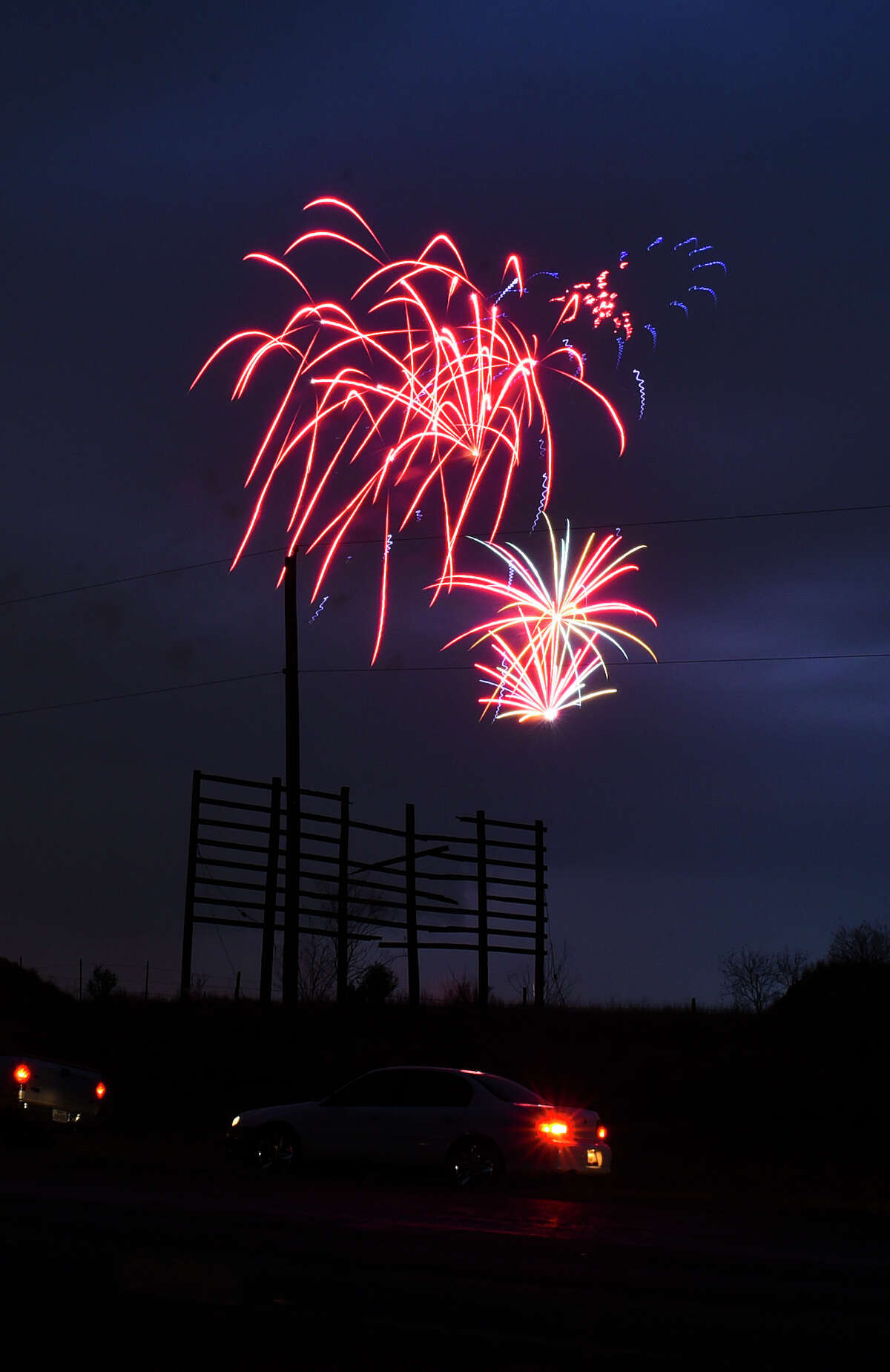 The WBCA H-E-B Fireworks Extravaganza lights up the sky along with lightning from a storm rolling in on Sunday, February 18, 2017 as this year's WBCA events come to a conclusion.