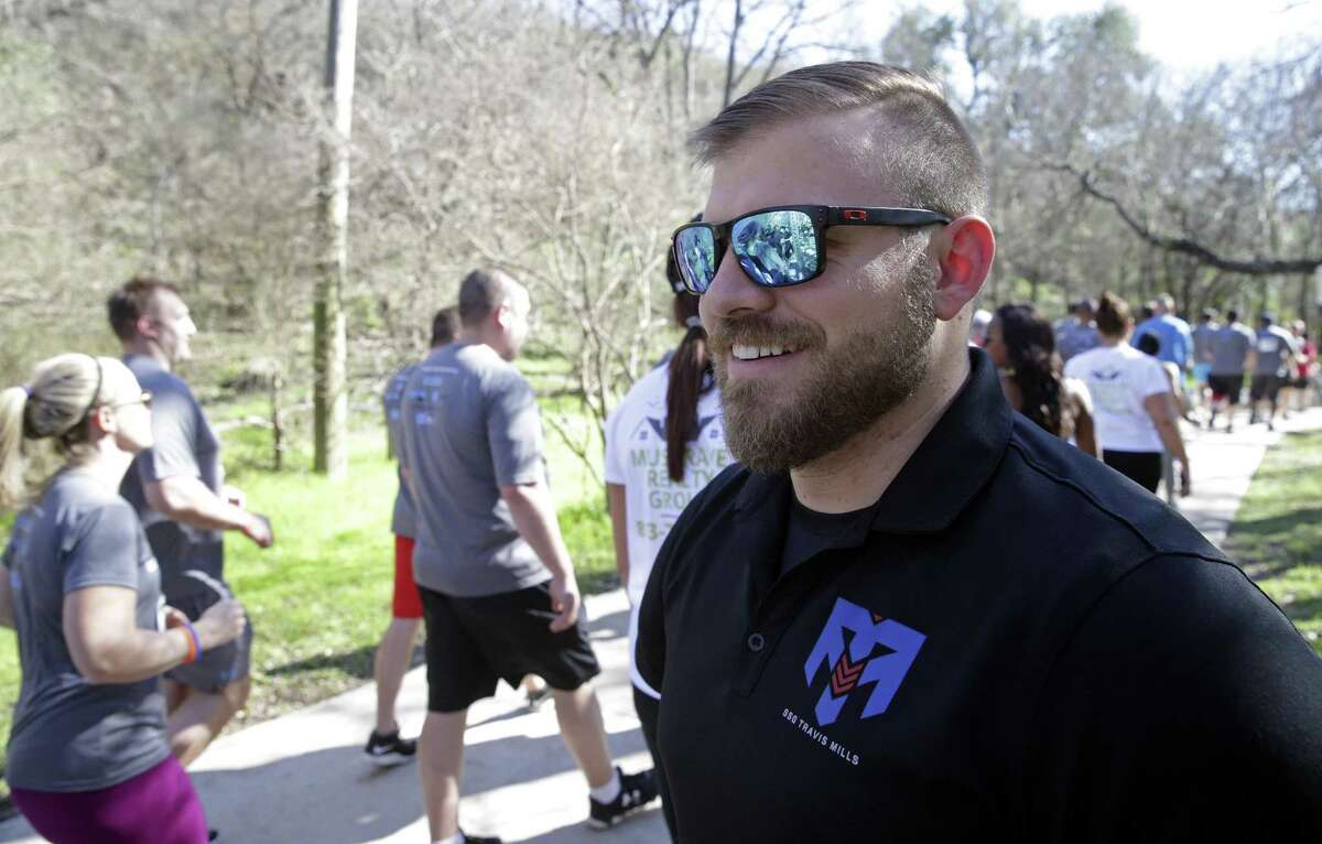 Travis Mills, a quadruple amputee Army veteran serves as the honorary starter for 5K run at Lady Bird Johnson Park on February 17, 2017.