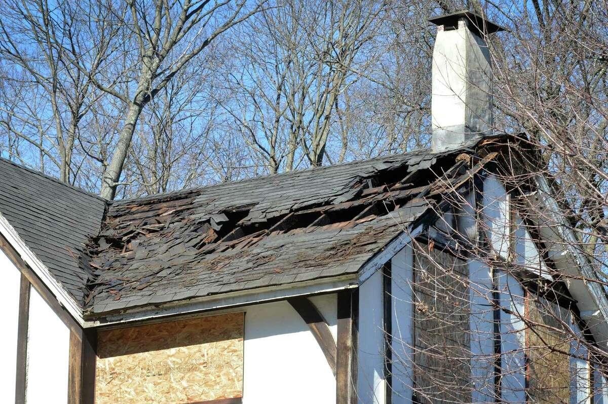 The burned roof at the house on Bettswood Rd, on Monday February 20, 2017 after a deadly fire on Sunday morning in Norwalk Conn.