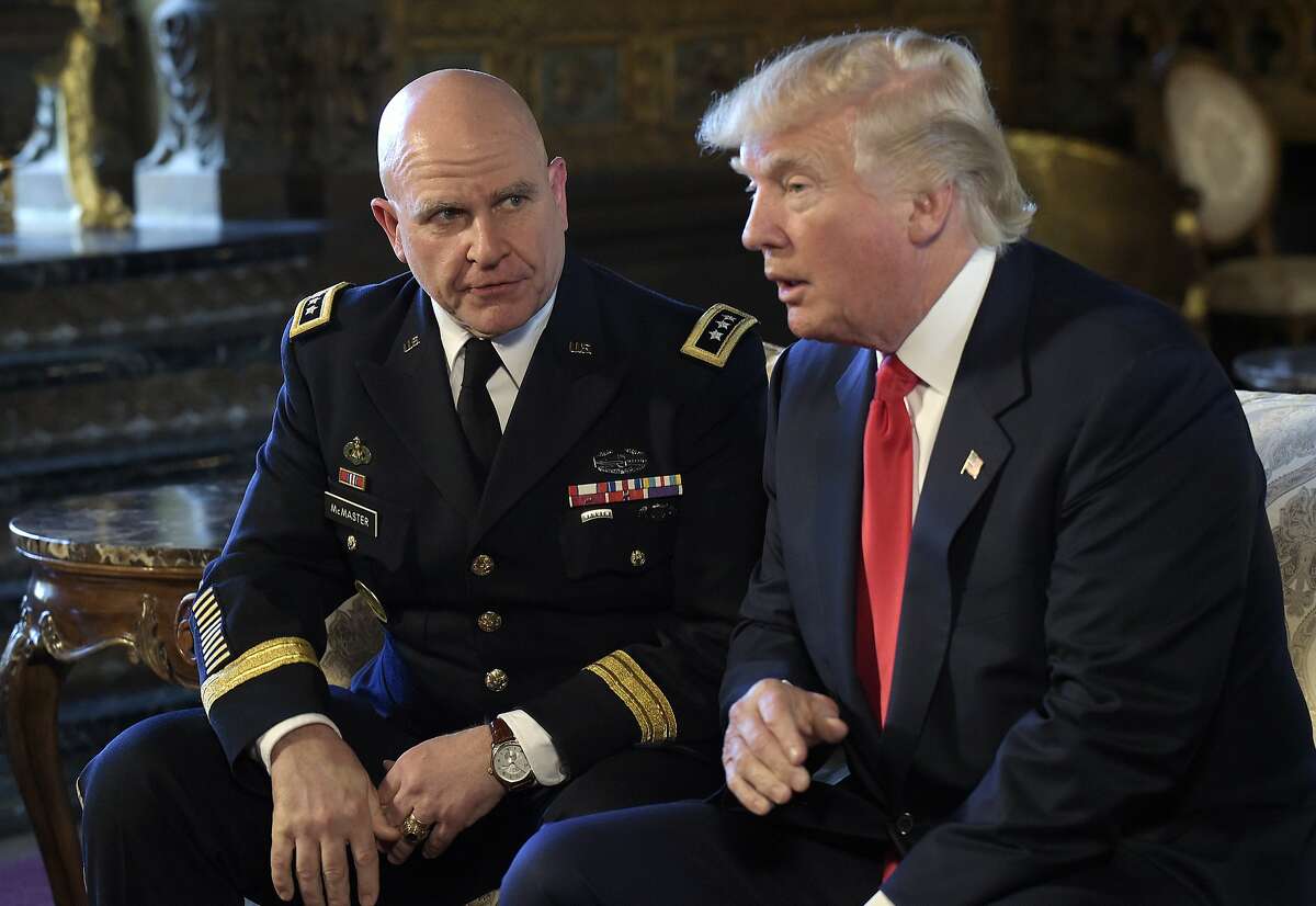 President Donald Trump, right, speaks as Army Lt. Gen. H.R. McMaster, left, listens at Trump's Mar-a-Lago estate in Palm Beach, Fla., Monday, Feb. 20, 2017, where Trump announced that McMaster will be the new national security adviser. (AP Photo/Susan Walsh)