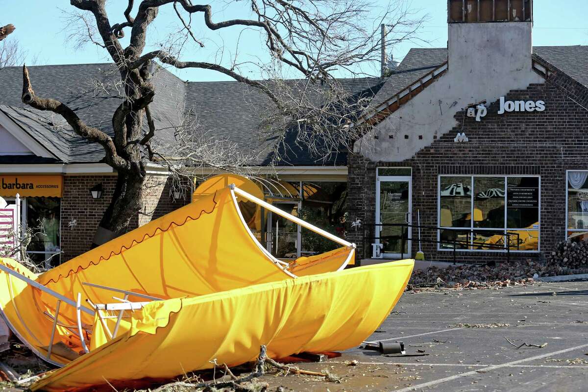 A view of damage at the Carousel Court after tornadoes moved through the area late Sunday night.