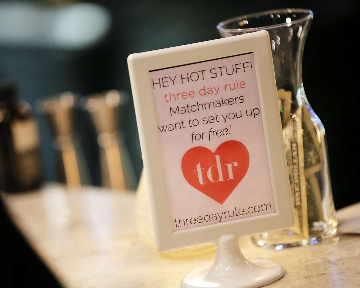 Some event signage on the bar during a Three Day Rule matchmaking event at LV Mar Restaurant in Redwood City, Calif., on Wednesday, February 8, 2017. The matchmaking service Three Day Rule launched a chapter in Silicon Valley, hoping to help techies too busy to find love make the right match.