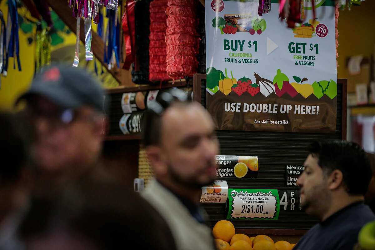 A sign for "Double Up Food Bucks" is seen at Arteagas Food Center in San Jose, California, on Sunday, Feb. 19, 2017.