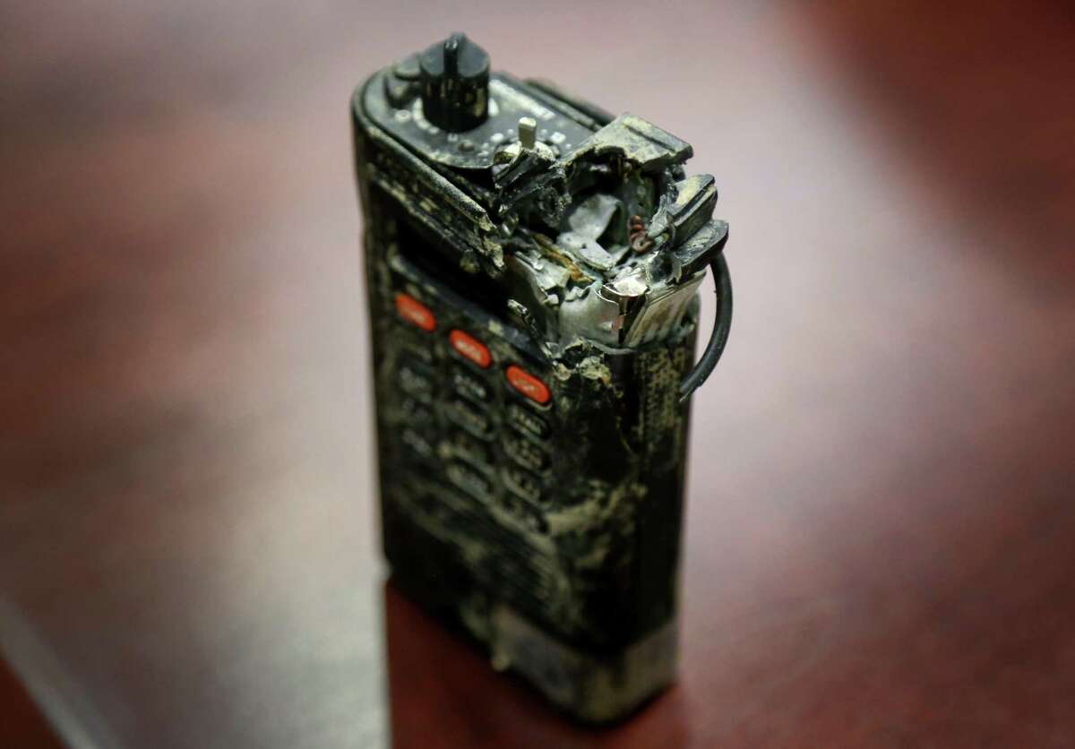 A radio used by ATF Assistant Special Agent in Charge Gary Orchowski during the ATF raid on the Branch Davidian compound is seen Monday, Jan. 9, 2017, in Houston. The radio was hit by a bullet during the firefight. ( Jon Shapley / Houston Chronicle )