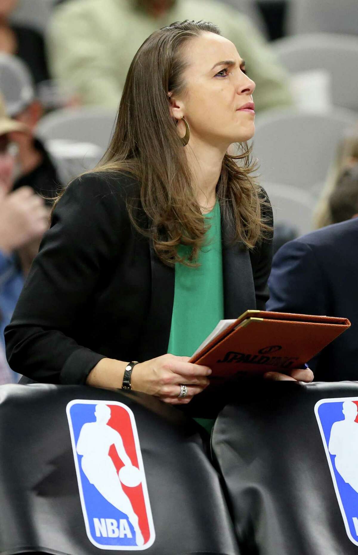 San Antonio Spurs assistant coach Becky Hammon pauses during a first half timeout against the Dallas Mavericks Sunday Jan. 29, 2017 at the AT&T Center.