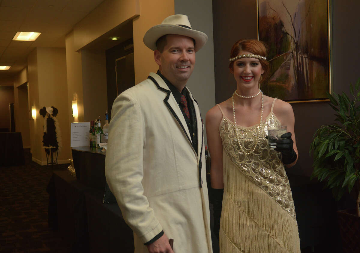 Jason Culpepper, left, and Sara Theut show off their '20s flare during the Cy-Fair Houston Chamber of Commerce "A Night of Celebration" gala at the Norris Conference Center in Houston on Feb. 17, 2017. (Photo by Jerry Baker/Freelance)