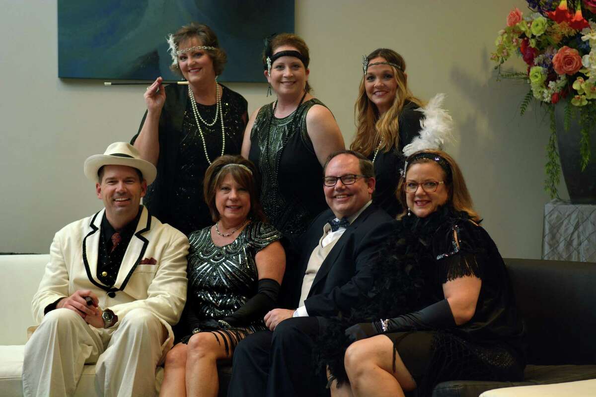 Jason Culpepper, front row from left, Paula Harvey, Eric Dunlap, and Angila Ervin, and Sue Fullerton, back row from left, Leslie Martone, and Jennifer Ellis show off their '20s flare during the Cy-Fair Houston Chamber of Commerce "A Night of Celebration" gala at the Norris Conference Center inHouston on Feb. 17, 2017. (Photo by Jerry Baker/Freelance)