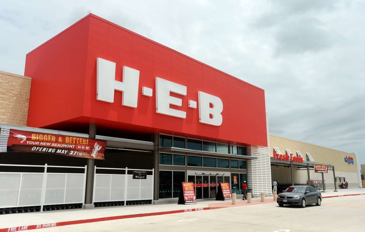 A car passes by the new H-E-B on Tuesday. The new H-E-B location on College Street held a preview of their new store for the media and VIPs on Tuesday. The 56,000 square foot store will open to the public at 6 a.m. Wednesday. Photo taken Tuesday 5/26/15 Jake Daniels/The Enterprise