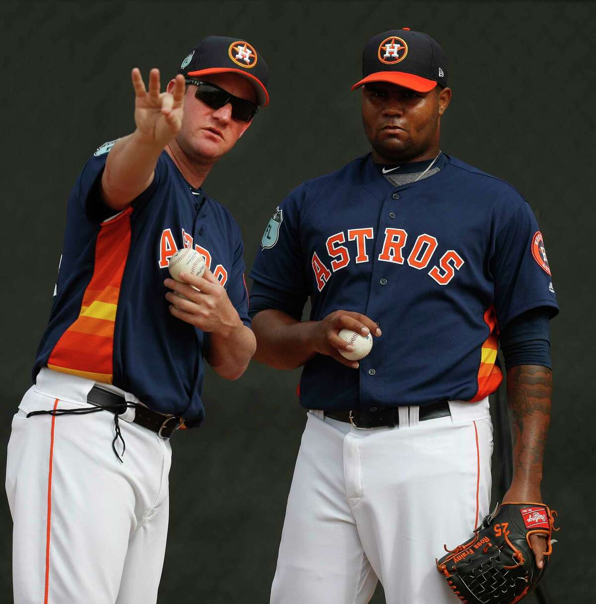 Roy Oswalt, left, and top prospect Francis Martes discussed such things as how to grip a changeup.