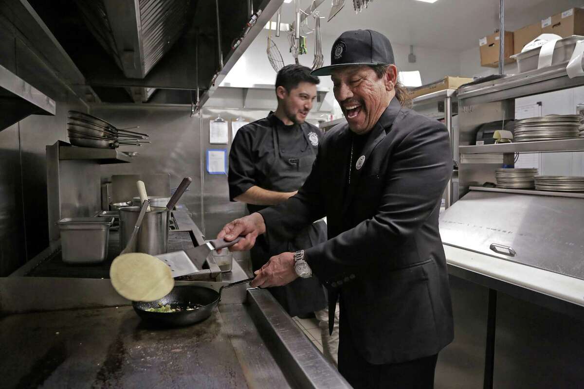 Actor Danny Trejo hopes to expand his taco restaurants from California to the Alamo City, he said in and interview. Here, Trejo and chef John-Carlos Kuramoto cook up their vegan cauliflower taco.