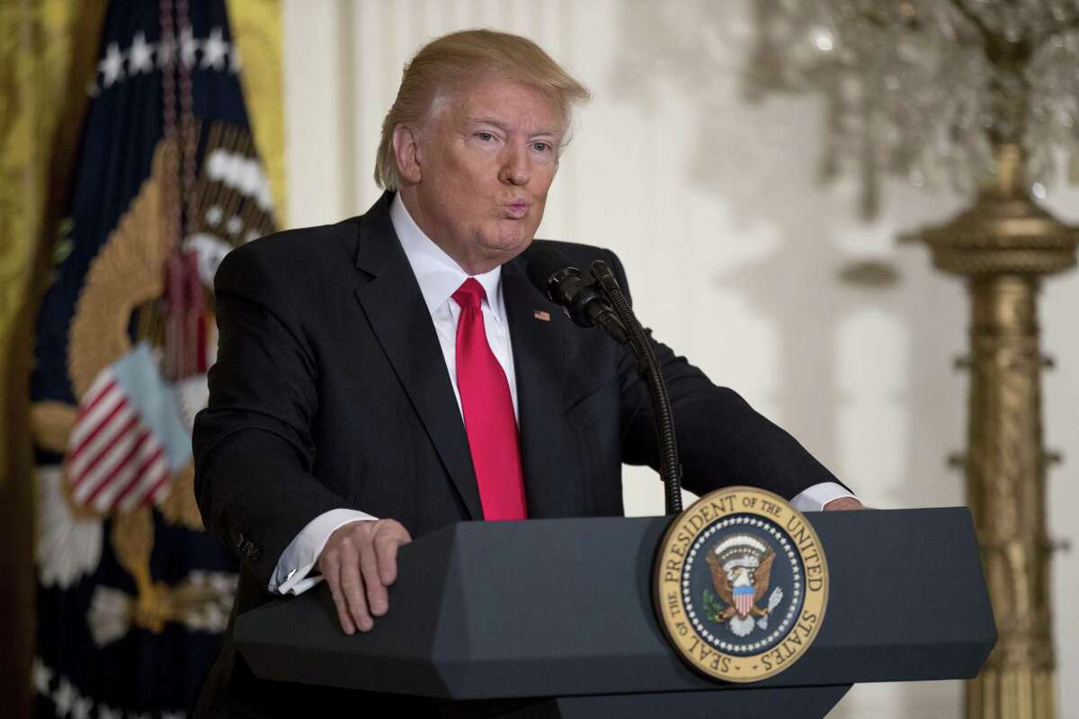 President Donald Trump pauses while speaking during a news conference in the White House. A reader criticizes the president for his attack on federal judges.