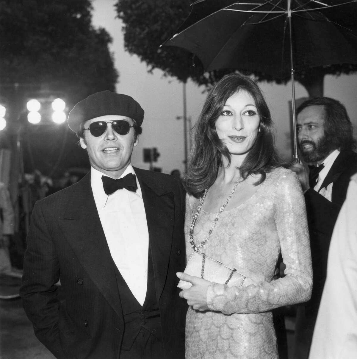 Jack Nicholson and Anjelica Huston arrive together at the Academy Awards on April 8, 1975. They dated on-again, off-again until 1989.