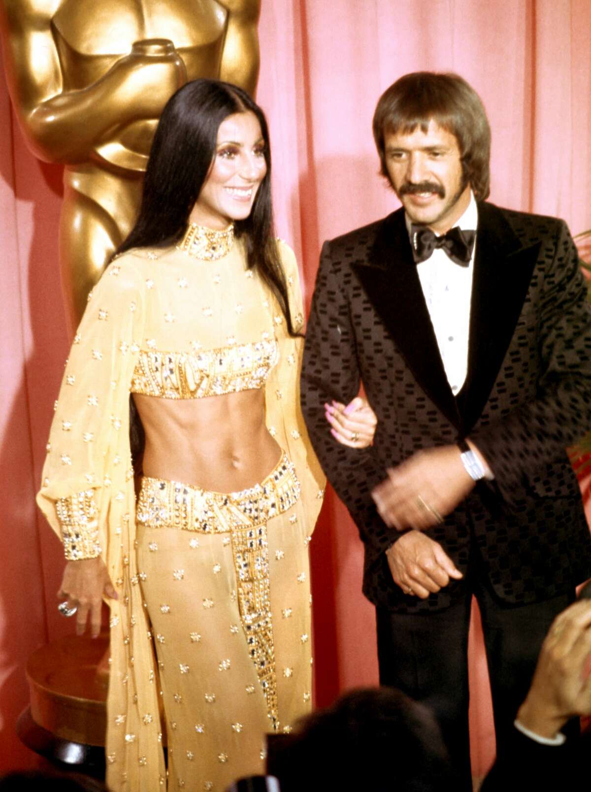 Sonny Bono and Cher attend the Academy Awards ceremony on March 27, 1973. The couple divorced in 1975. Keep clicking to see more throwback couples at the Academy Awards. 