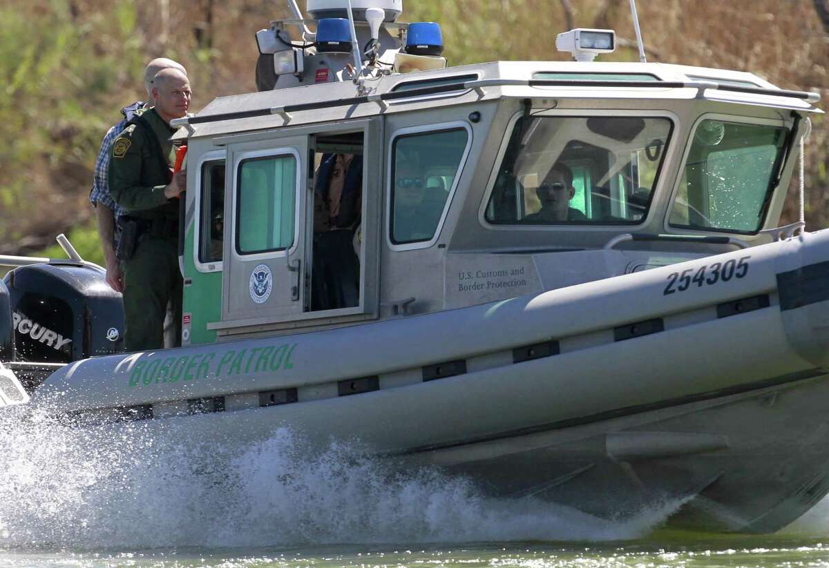 A U.S. Customs and Border Protection boat carrying U.S. Speaker of the House Paul Ryan travels down the Rio Grande Wednesday, Feb. 22, 2017 south of Mission, Texas. Ryan and Rep. Michael McCaul, R-Texas, toured the Texas border with Mexico by air and boat, as well as U.S. Border Patrol facilities in the area. (Nathan Lambrecht/The Monitor via AP)