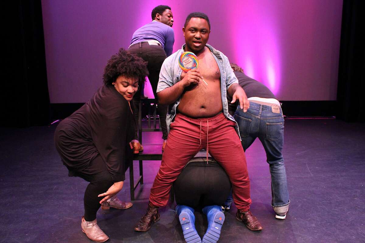 AeJay Mitchell, center, surrounded by (clockwise from left) Indiia Wilmott, Rotimi Agbabiaka, Aaron Wilton and Kehinde Koyejo in �Bootycandy� at Brava Theater.