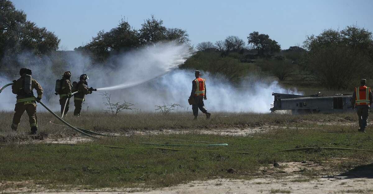Joint Base San Antonio firefighters take part in a simulated a military aircraft crash. The exercise involved various agencies from Bexar County, Atascosa County and Joint Base San Antonio.