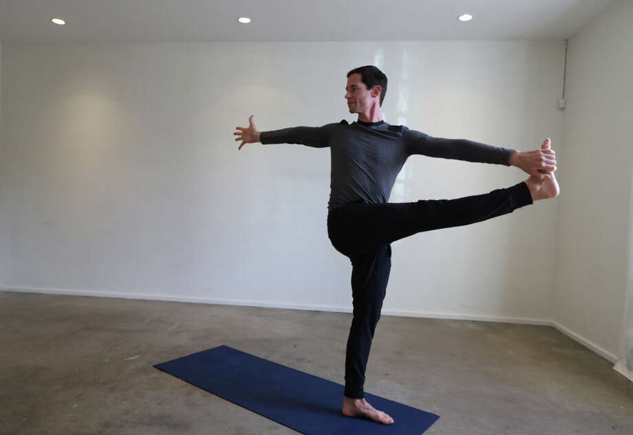Houston Chronicle Yoga Challenge Day 22: Standing Twist - Houston Chronicle