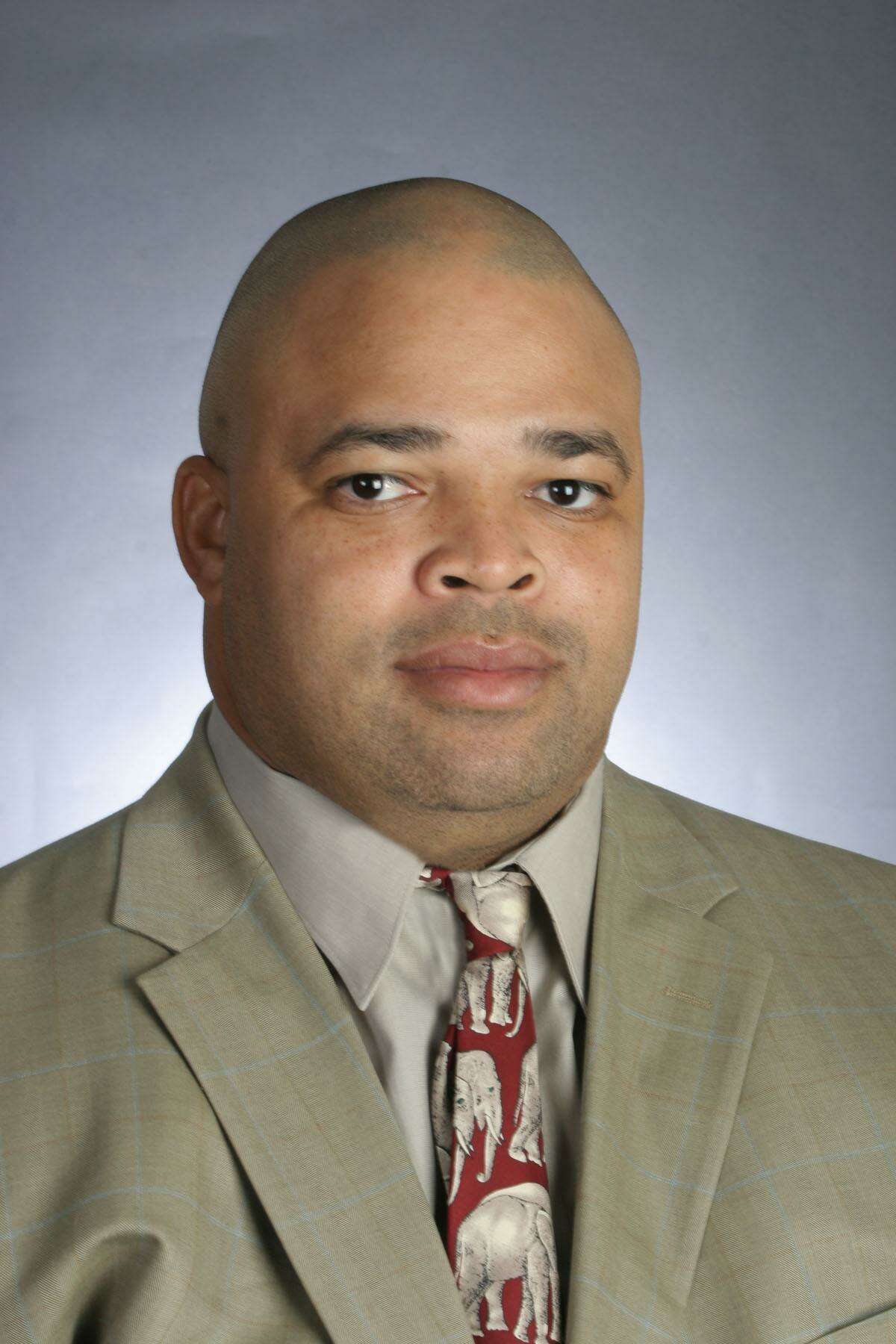Bo Davis, who will coach the defensive line, was fired at Alabama for alleged recruit ing violations.