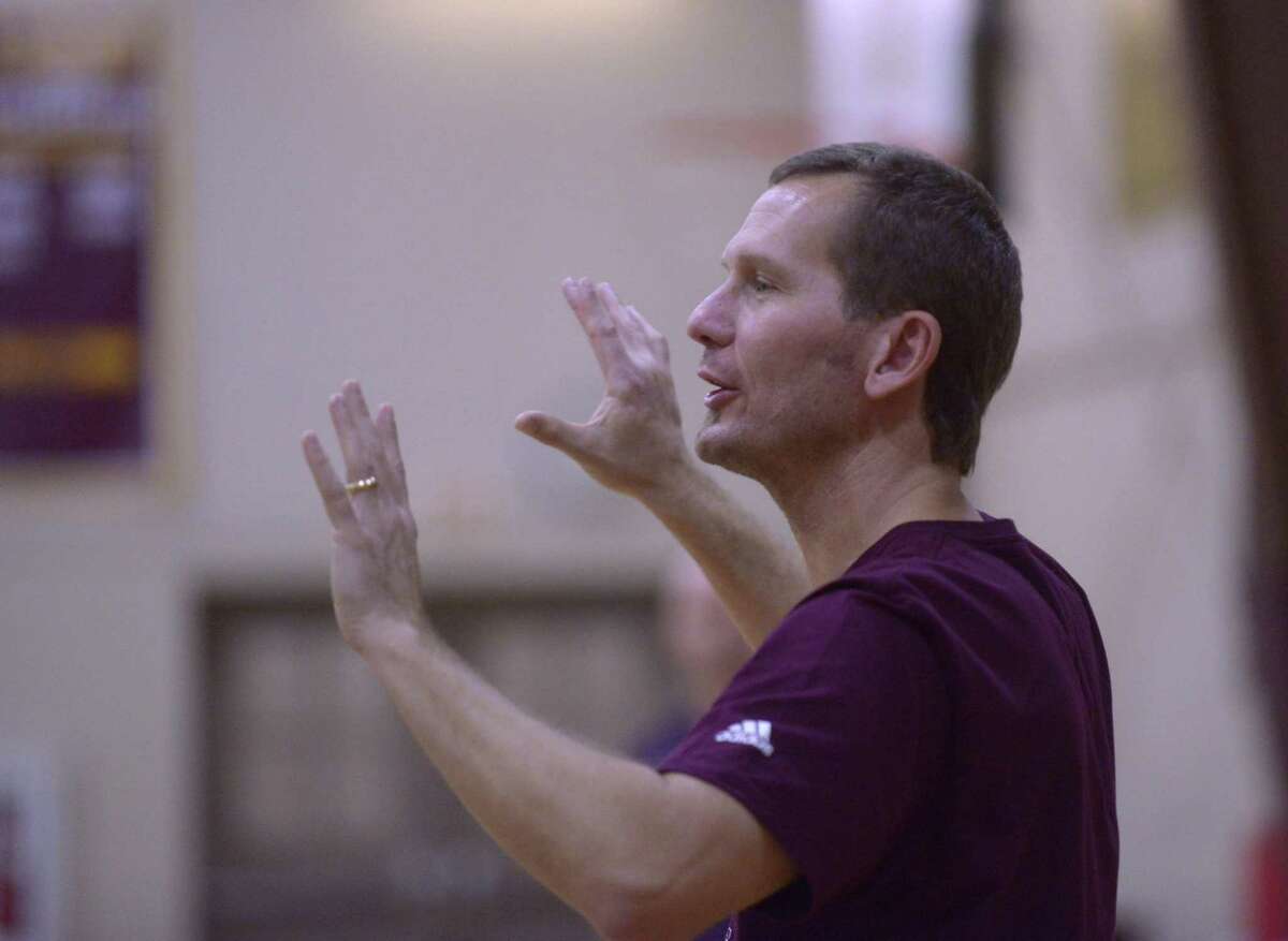 San Antonio Christian girls coach Brian Hannas directs his team during practice on Wednesday, Feb. 22, 2017. They will be going to the TAPPS tournament in Abilene.