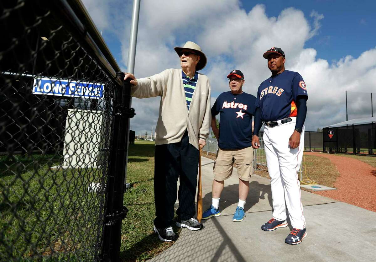 J. W. "Jay" Porter, 84, a former Major League Baseball player who played for the St. Louis Browns, Detroit Tigers, Cleveland Indians, Washington Senators, and St. Louis Cardinals, visited Houston Astros assistant hitting coach Alonzo Powell along with his friend Tim Newsted, center, during spring training at The Ballpark of the Palm Beaches, in West Palm Beach, Florida, Thursday, February 23, 2017.