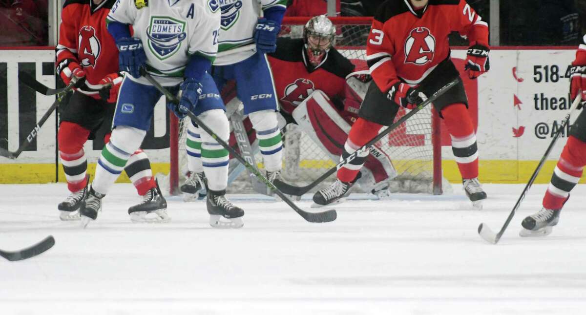 Albany Devils goalie Mackenzie Blackwood tries to keep his eyes on the puck during their game against the Utica Comets on Monday, Feb. 20, 2017, in Albany, N.Y. (Paul Buckowski / Times Union) ORG XMIT: MER2017022016080673