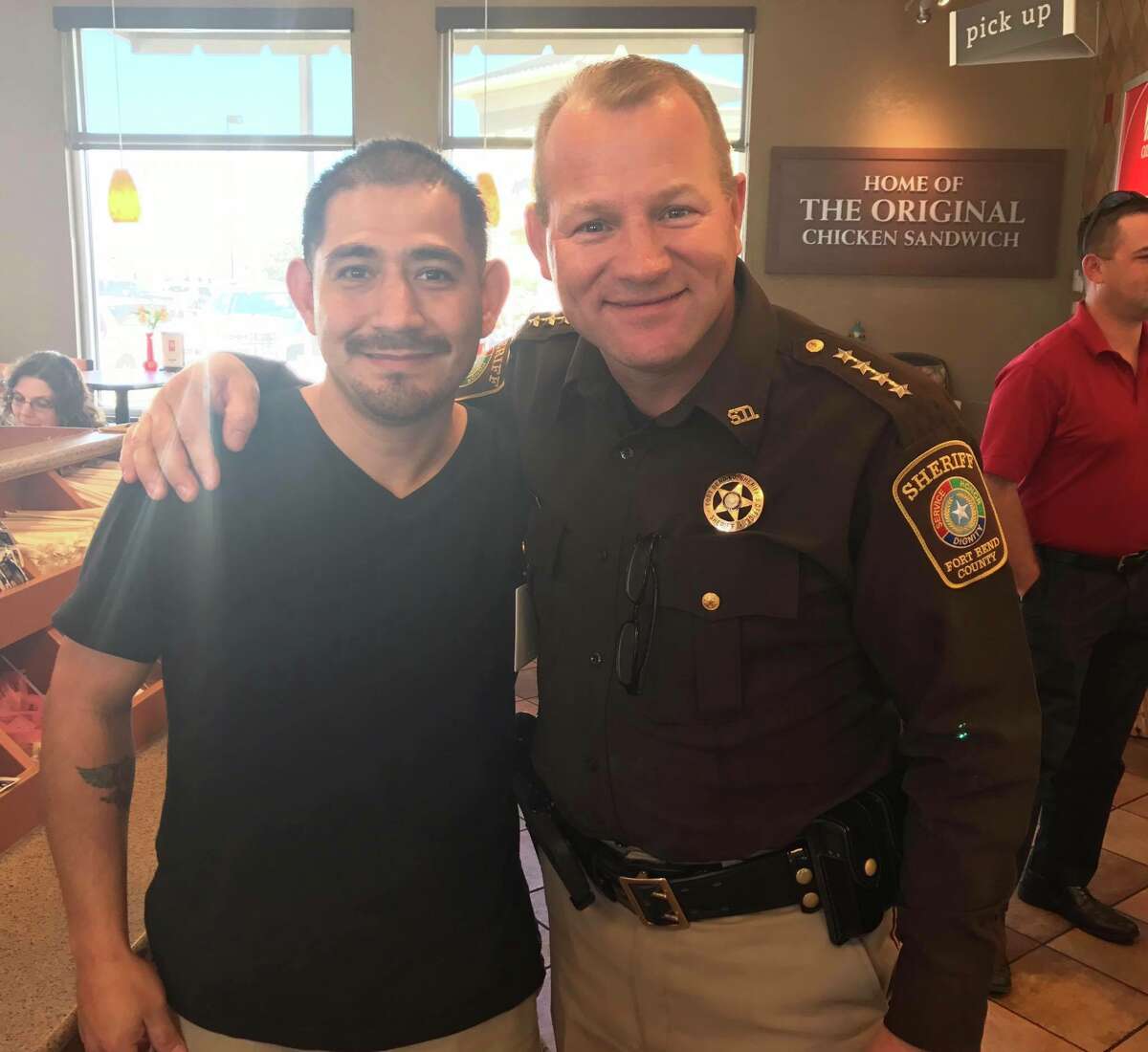 Louis Palacios, left, said Thursday that he is grateful to Sheriff Troy Nehls, who used the Heimlich maneuver to save Palacios from choking at the Rosenberg Chick-Fil-A on Feb. 22. 