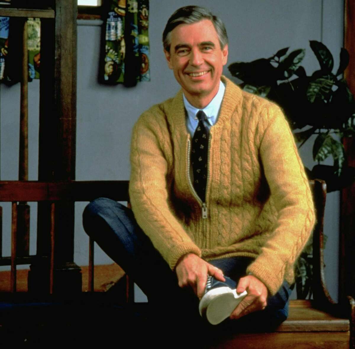 The temperate words of Fred Rogers, shown on the set of “Mister Rogers’ Neighborhood” in 1996, contrast with the man we’ve elected president. Trumpism lashes out at the outside world with fear and suspicion. Rogers embraced it.
