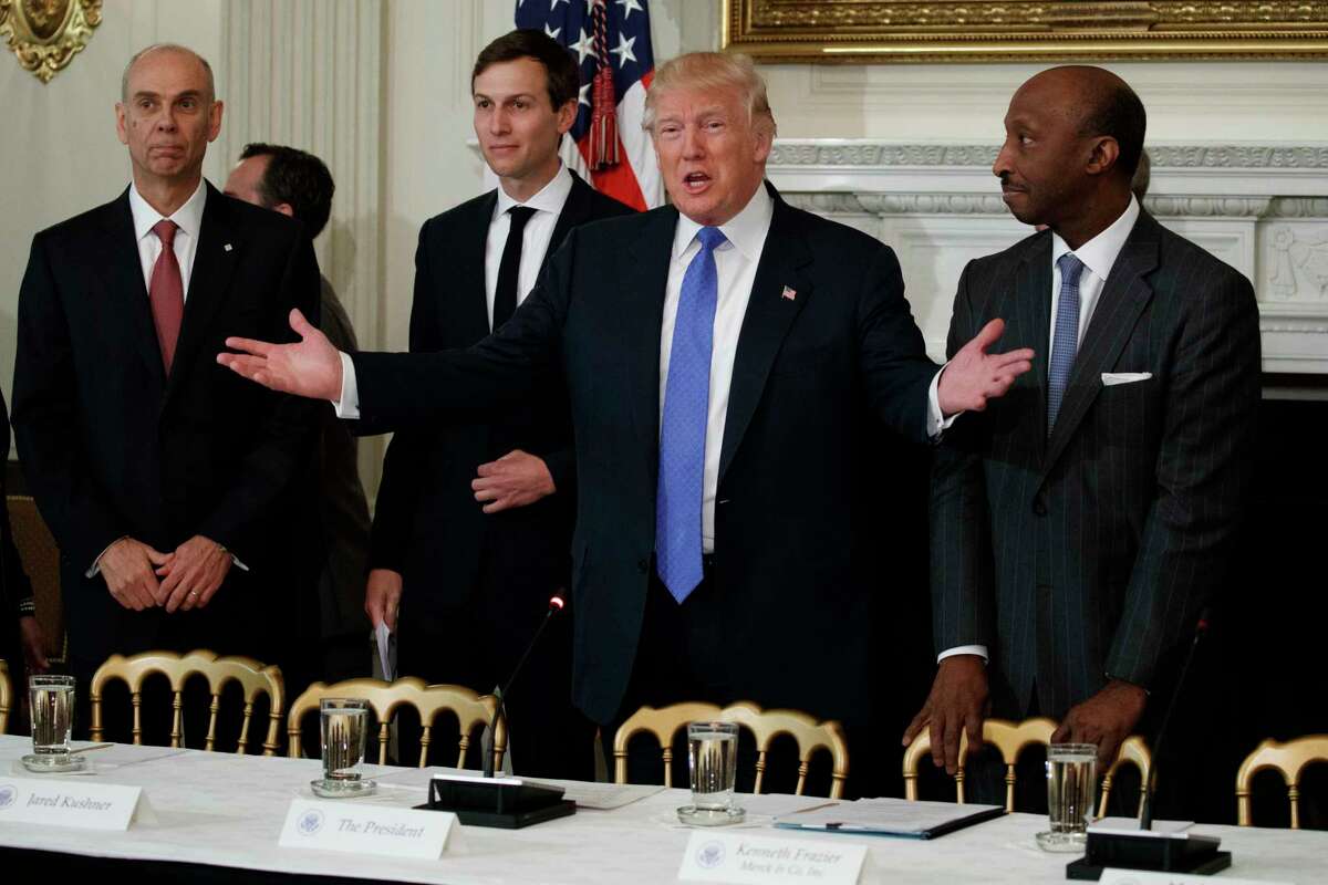 President Donald Trump welcomes manufacturing executives to a meeting in the Roosevelt Room of the White House in Washington, Thursday, Feb. 23, 2017. From left are, Archer Daniels Midland CEO Juan Luciano, White House Senior Adviser Jared Kushner, Trump, and Merck CEO Kenneth Frazier. (AP Photo/Evan Vucci)