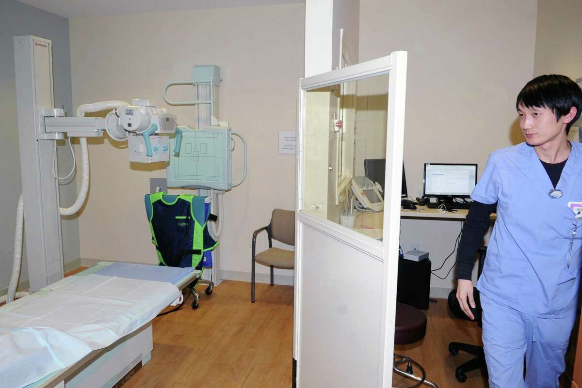 Radiology technicianat Hushan Yin prepares an x-ray machine for a patient at the Stamford Health Medical Group, Stamford Hospital's outpatient center in Stamford, Conn., Tuesday, Feb. 21, 2017. The facility located at 292 Long Ridge Road houses doctors focusing on primary care, cardiology, endocrinology, neurology, obstetrics, gynecology and orthopedics, as well as diagnostic imaging labs and a walk-in center.