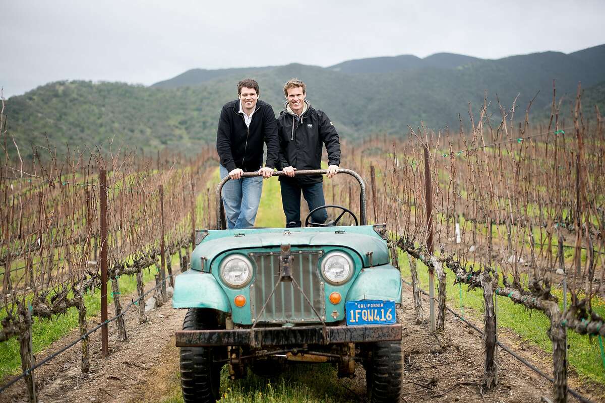 Mark, right, and Jeff Pisoni stand in a Willy's jeep at Pisoni Vineyards in Gonzales, Calif., on Sunday, Feb. 19, 2017.
