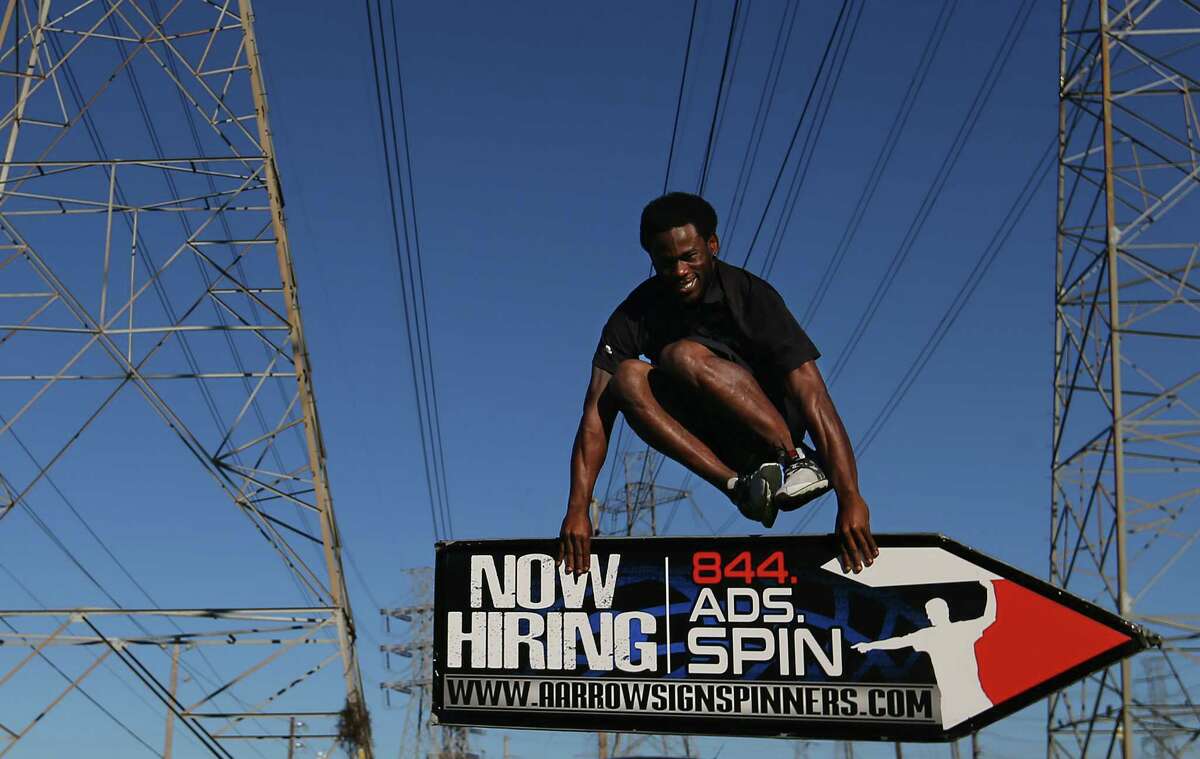Houston sign spinners to show off their top "tricks" in Vegas