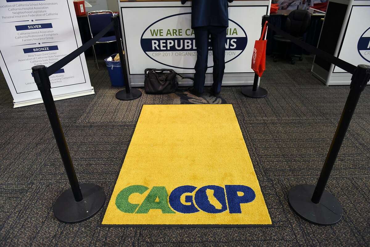 Attendees sign in at registration booths during the California Republican Party's 2017 Organizing Convention in Sacramento, CA, on Friday February 24, 2017.