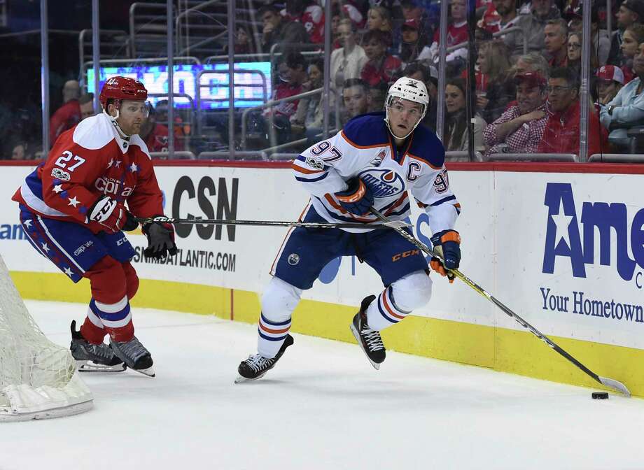 Caps Win 13th In Row At Home Times Union Edmonton Oilers Center Connor Mcdavid 97 Looks To Pass As Washington Capitals Defenseman Karl