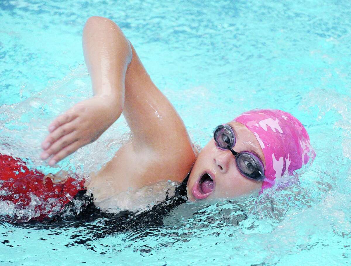 "I am going to do 100 laps," said club member Annie Clark, 10, pictured here participating in the 12th annual Boys and Girls Club of Greenwich Swim-A-Thon fundraiser to raise money for the club's aquatics programs at Boys & Girls Club pool, Greenwich, Conn., Saturday morning, Feb. 25, 2017. Club swim coach Maxine Montello said "it is nice to see all of our club swim team members giving back and supporting the club that supports them so much. It's a great day."