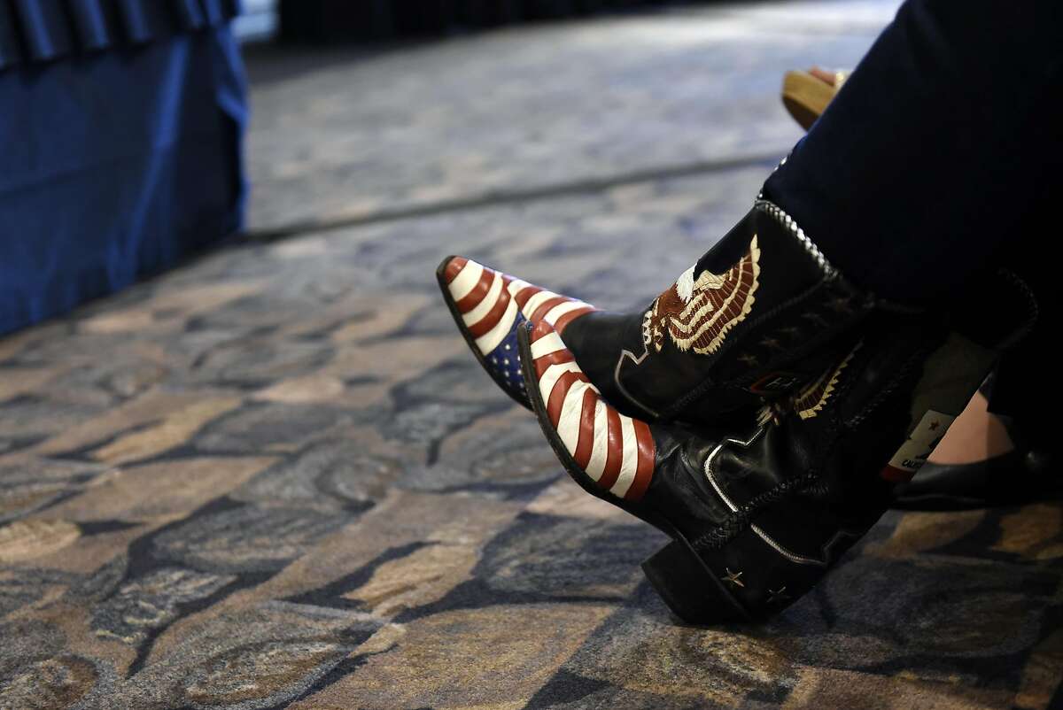 Mary Johnson of Paso Robles wears American flag and bald eagle adorned boots as she attends a Tea Party General Meeting at the California Republican Party's 2017 Organizing Convention in Sacramento, CA, on Saturday February 25, 2017.
