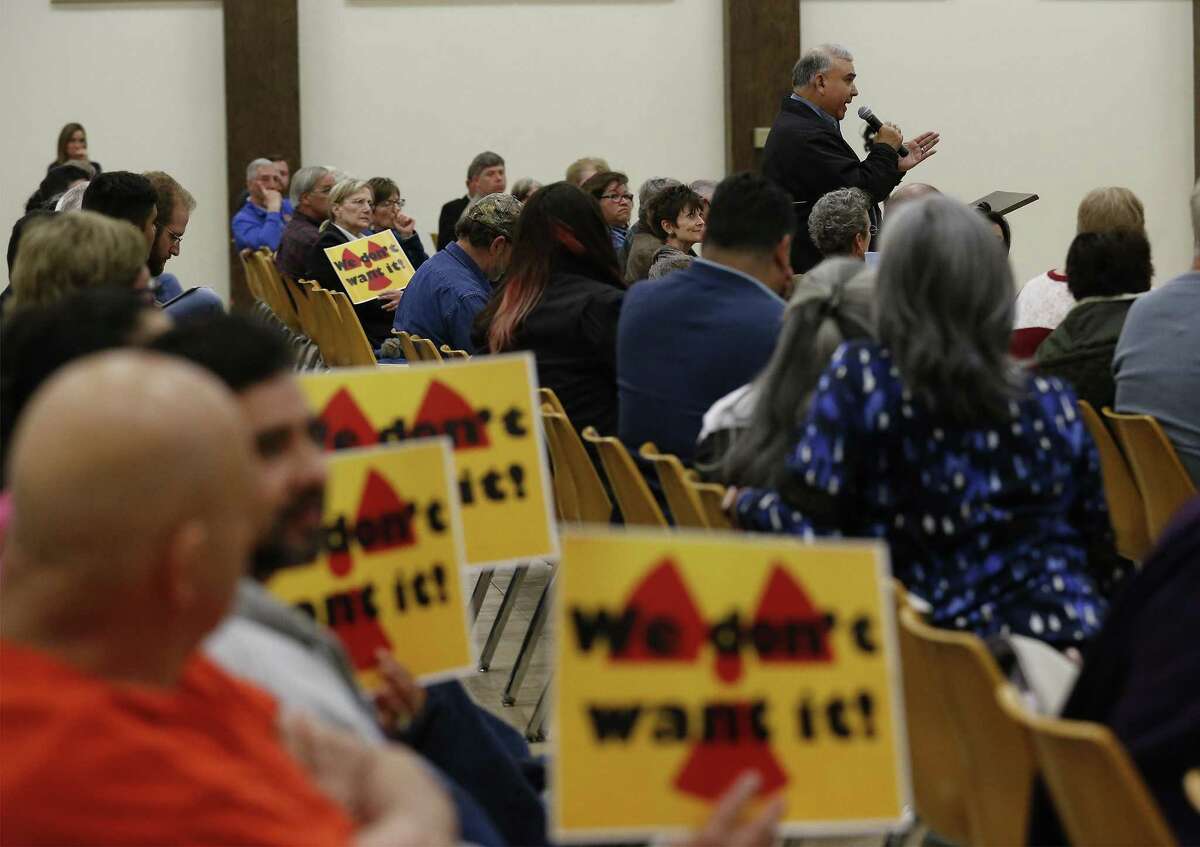 Opponents and proponents to Waste Control Specialists (WCS) near Andrews, Texas wanting to become an interim storage site for high-level radioactive waste attend a Nuclear Regulatory Commission hearing in Andrews, Texas on Wednesday, Feb. 15, 2017.