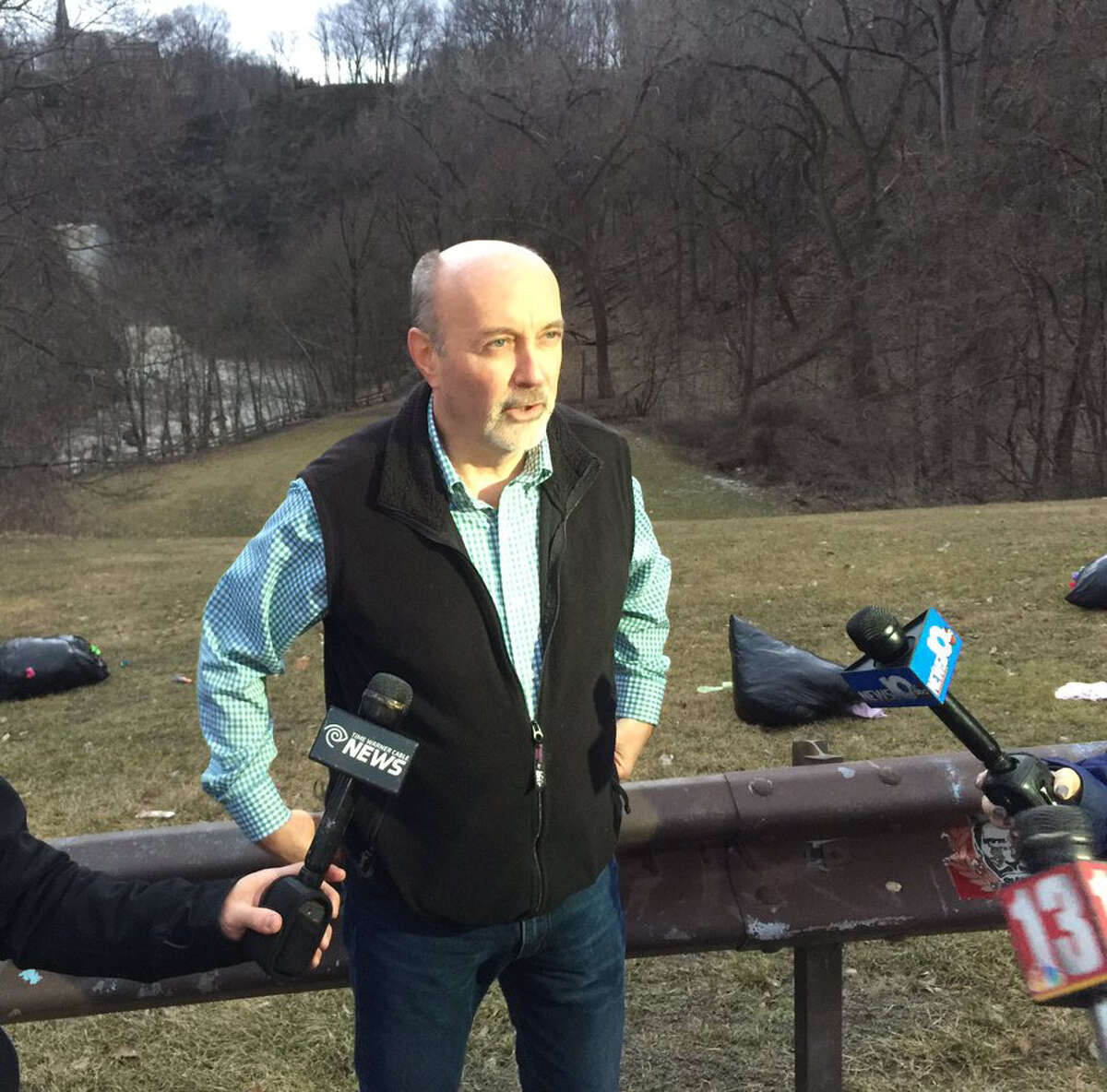 Troy Mayor Patrick Madden speaks to the press near the Poestenkill Gorge where witnesses reported a man fell into the water and did not resurface on Saturday, Feb. 25, 2017.