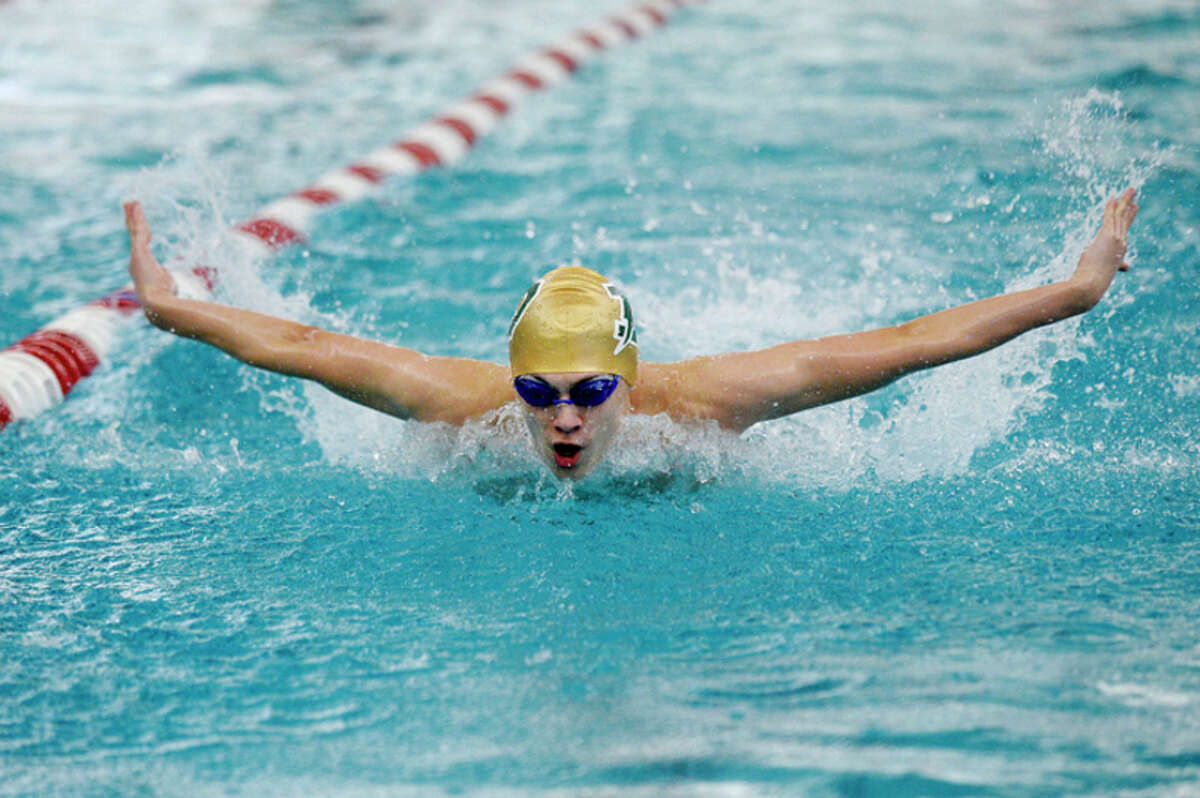 NICK KING | nking@mdn.net Dow's Joey Park swims the butterfly during the 200 yard IM final during the Saginaw Valley League Swimming Championship finals on Saturday at Saginaw Valley State University.