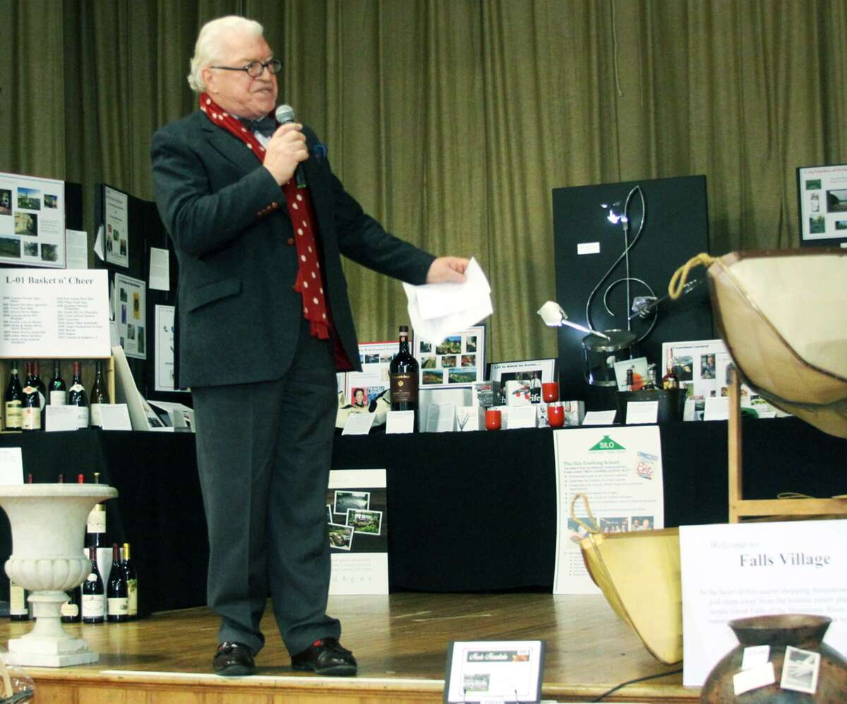 Author Frank Delaney serves as able substitute for actress Christine Baranski as hononary chairman of the the Housatonic Valley Association's annual benefit auction, Nov. 23, 2014 at Washington Primary School.